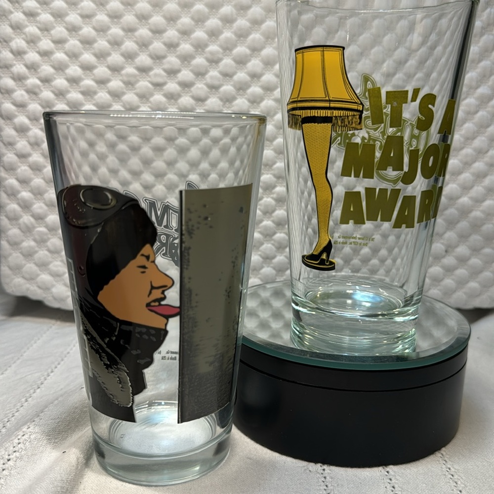 A Christmas story glasses leg lamp & tongue on pole set of 2 VTG glass tumblers